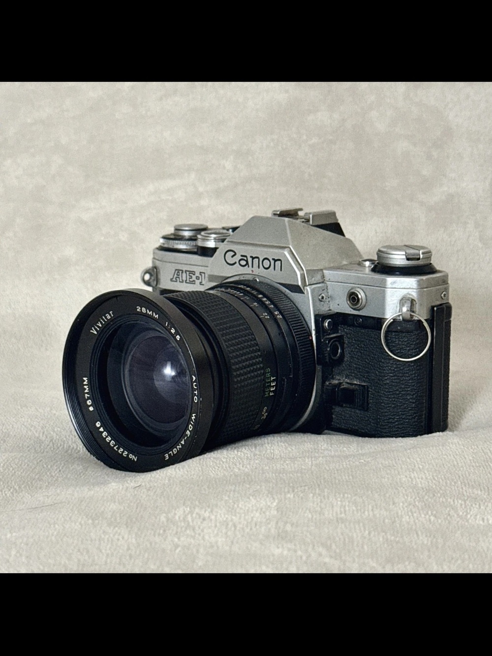 Vintage Canon AE-1 35 mm Film Camera With Vivitar 28mm f2.5 wide angle Lens